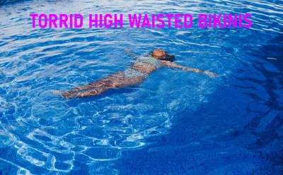 Torrid high waisted bikini: 5 styles detailed : Woman swimming in a torrid high waisted bikini